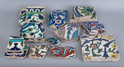Lot 571 - A quantity of broken Iznik tiles