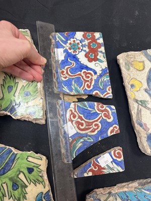 Lot 571 - A quantity of broken Iznik tiles