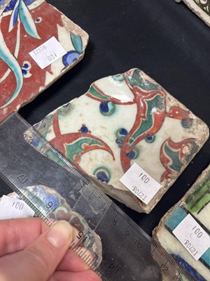 Lot 571 - A quantity of broken Iznik tiles