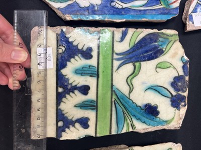 Lot 571 - A quantity of broken Iznik tiles