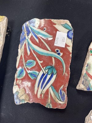 Lot 571 - A quantity of broken Iznik tiles