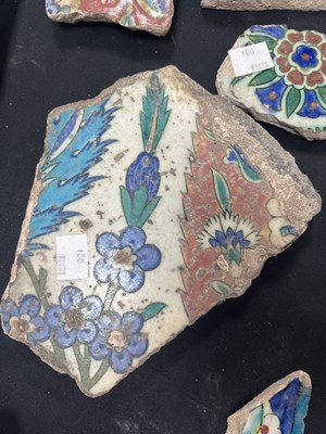 Lot 571 - A quantity of broken Iznik tiles