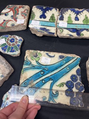 Lot 571 - A quantity of broken Iznik tiles