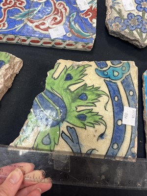 Lot 571 - A quantity of broken Iznik tiles
