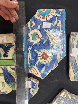 Lot 571 - A quantity of broken Iznik tiles