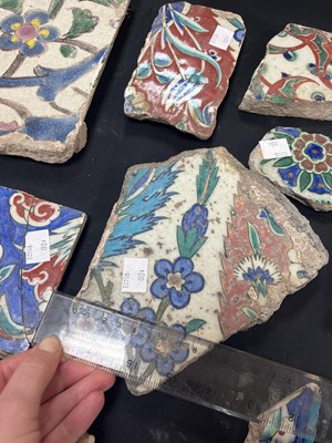 Lot 571 - A quantity of broken Iznik tiles