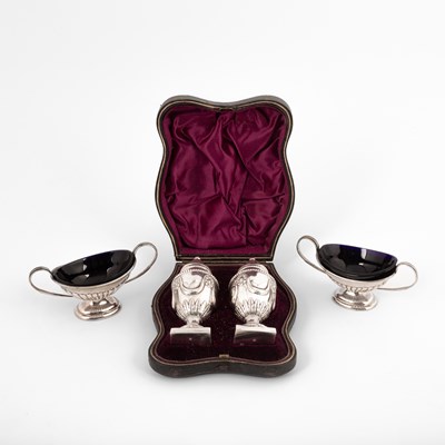 Lot 90 - A pair of Victorian silver pepper pots or small casters