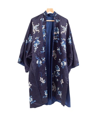 Lot 587 - A Chinese blue silk embroidered robe