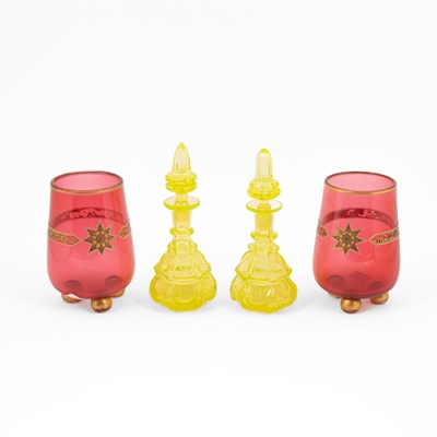Lot 840 - A pair of uranium glass scent bottles
