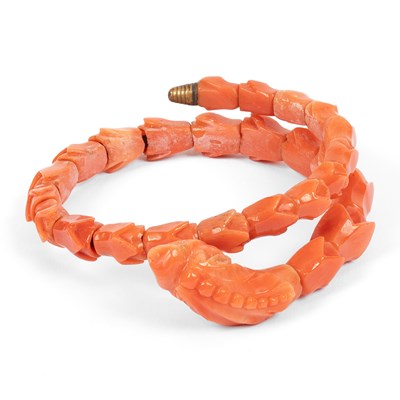Lot 203 - A Victorian carved coral serpent bracelet
