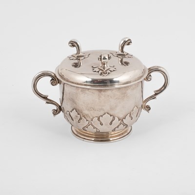 Lot 82 - A silver porringer and cover