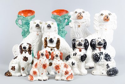 Lot 753 - A collection of Staffordshire pottery models of spaniels