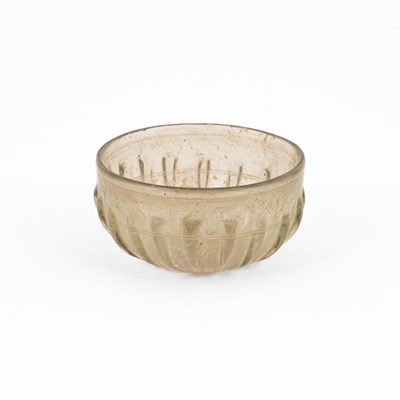 Lot 314 - A Roman pillar-moulded glass bowl