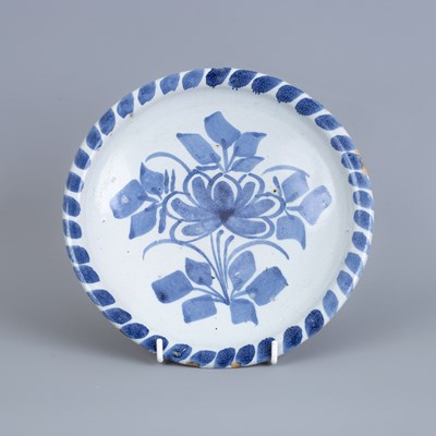 Lot 725 - An English Delftware blue dash dish