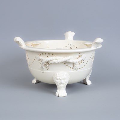 Lot 823 - A creamware warmer/kettle stand