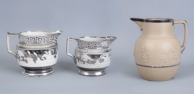 Lot 824 - Two silver lustre jugs
