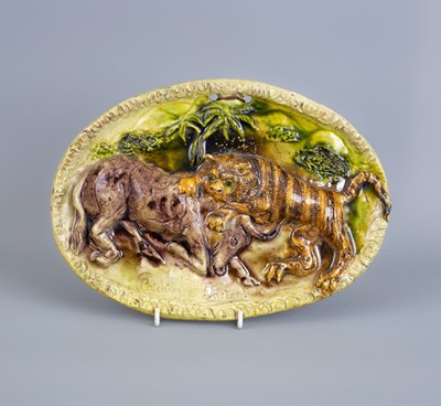 Lot 826 - An English pottery oval plaque