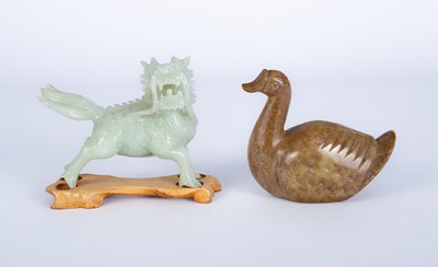 Lot 566 - A Chinese green jade Dog of Fo