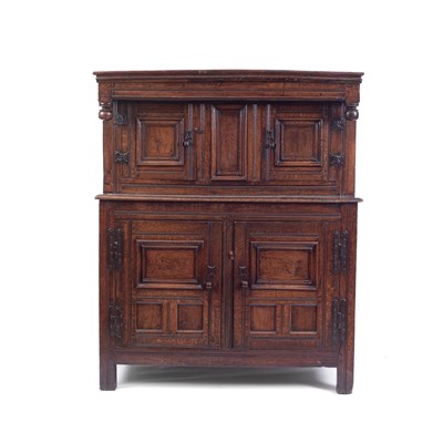 Lot 701 - An oak cupboard