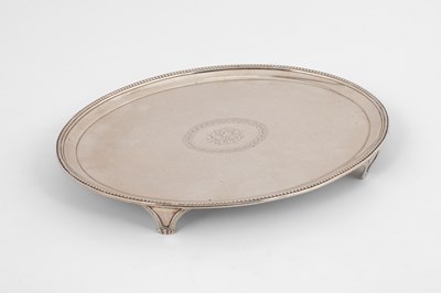 Lot 60 - A George III oval silver teapot stand