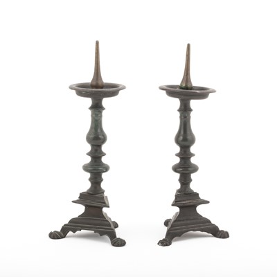 Lot 689 - A matched pair of brass pricket sticks
