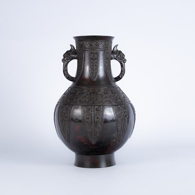 Lot 555 - A Chinese archaic design bronze vase