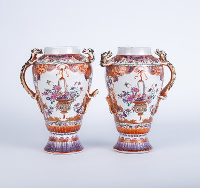 Lot 557 - A pair of Chinese famille rose vases