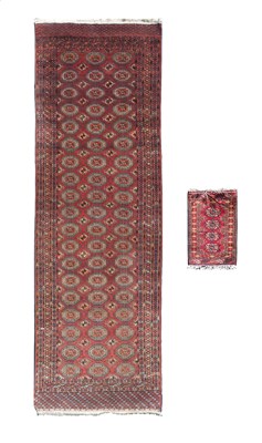 Lot 334 - A Bokhara long rug