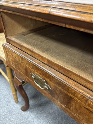 Lot 340 - A George I and later walnut lowboy