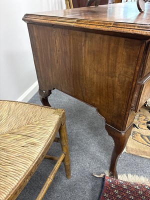 Lot 340 - A George I and later walnut lowboy