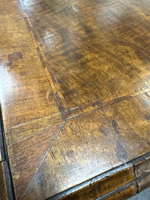 Lot 340 - A George I and later walnut lowboy