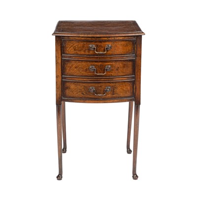 Lot 348 - A bowfront walnut bedside table