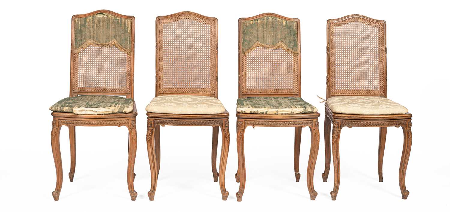 Lot 354 - A set of four French carved beech dining chairs