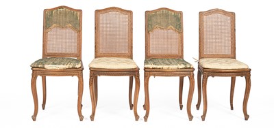 Lot 354 - A set of four French carved beech dining chairs