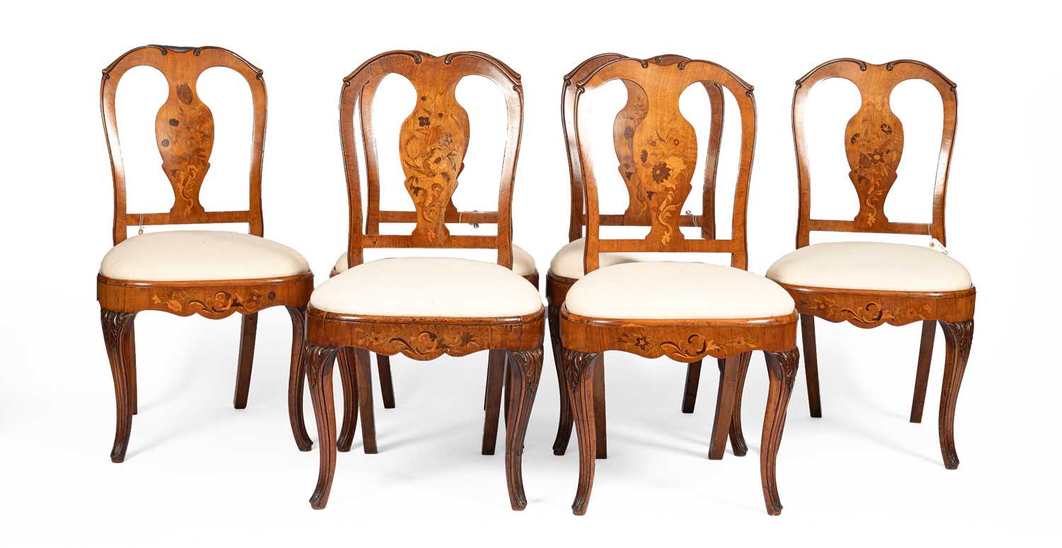 Lot 357 - A set of six Northern European fruitwood and marquetry inlaid dining chairs