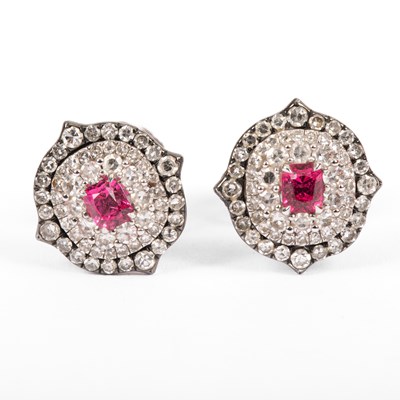 Lot 1 - A pair of white metal diamond and pink spinel cluster stud earrings