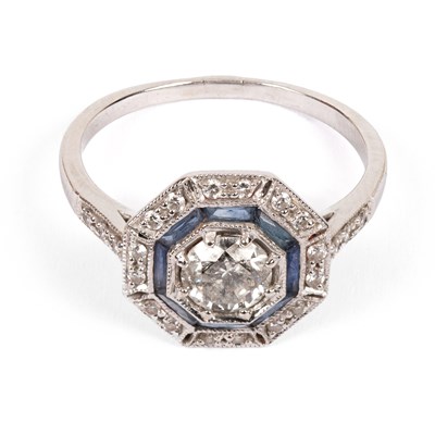 Lot 240 - A diamond and sapphire cluster ring
