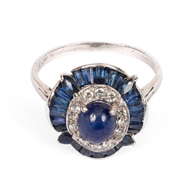 Lot 241 - A sapphire and diamond cluster ring