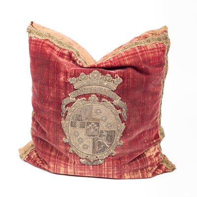 Lot 671 - A burgundy velvet cushion