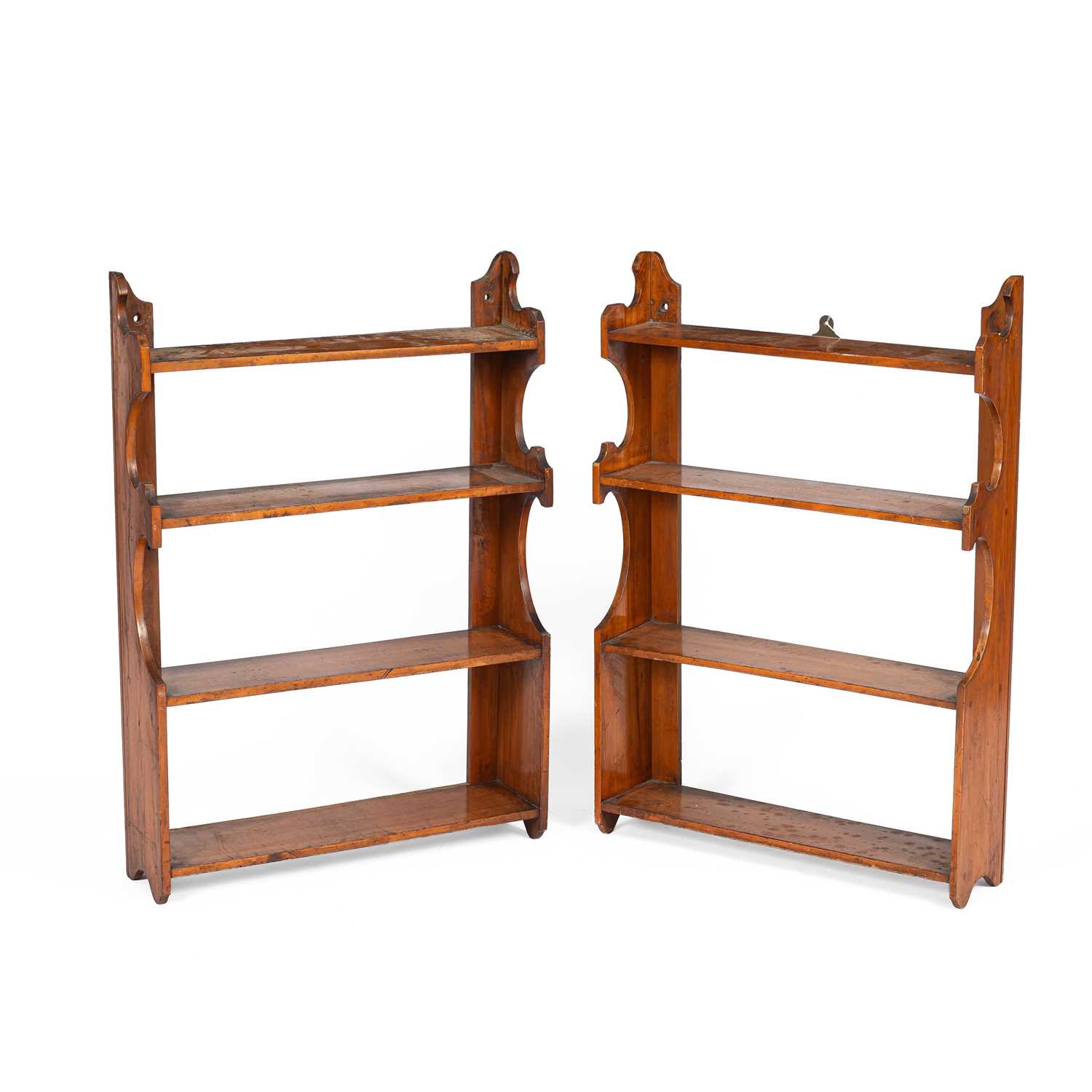 Lot 374 - A pair of fruitwood hanging shelves