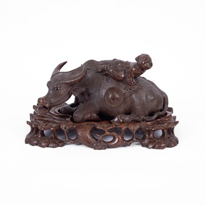 Lot 223 - A Chinese carved water buffalo with boy on his back