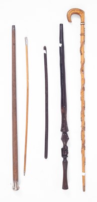 Lot 352 - A selection of walking sticks and canes