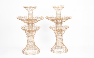 Lot 896 - Celestino Valenti, two large three-tier decorative wirework plant stands