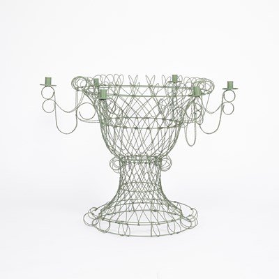 Lot 897 - Celestino Valenti, a decorative green wirework urn shaped plant stand