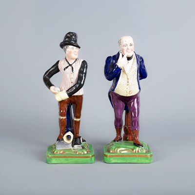 Lot 812 - A pair of Staffordshire figures of characters from Dickens