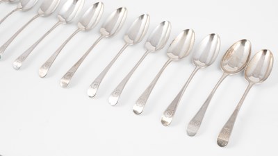 Lot 384 - Eleven George III silver dessert spoons
