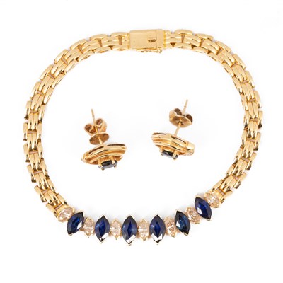 Lot 138 - A yellow metal sapphire and diamond bracelet
