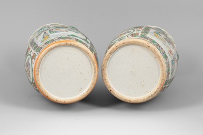 Lot 283 - A pair of Canton famille rose baluster vases