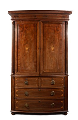Lot 845 - A late Regency mahogany bowfront linen press
