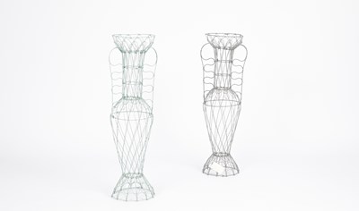 Lot 900 - Celestino Valenti, a pair of wirework amphora shaped garden stands